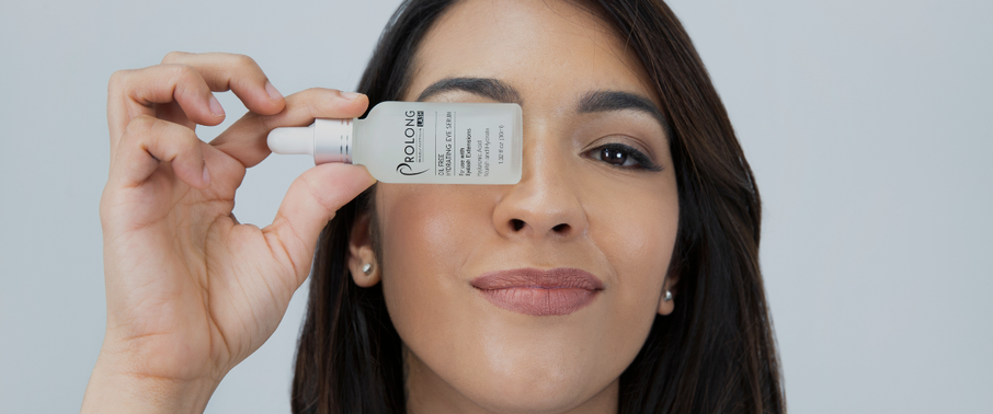 Girl holding Prolong Lash Under Hydrating Eye Serum