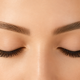 Closed eye with fluffy eyelash extensions.