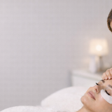 Lash Artist preparing their client